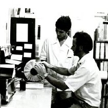 Tom Moore with counterpart Davy on SS HOPE Pharmacy in Natal.