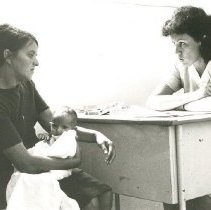 Project HOPE PH nurse Mary Ann Small with patient in Natal 1972