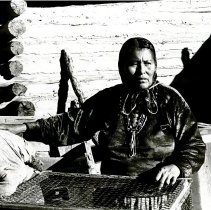 Navajo lady outside her dwelling near Ganado while Project HOPE there in 19