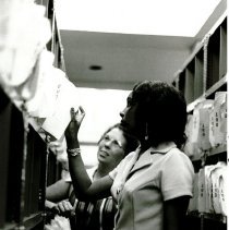 Med Records Tech Suan Wilson and counterpart on SS HOPE in Jamaica.