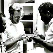 HOPE Dental Tech Bill Hersh with counterpart on SS HOPE in Jamaica 1971.
