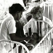 Unknown HOPE nurse/doctor with counterpart and patient in Jamaica.