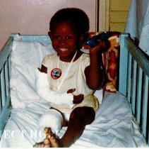 Pediatric patient with a HOPE badge on in Grenada.