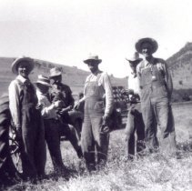 Tripp men at Elk Meadow Ranch with tractor