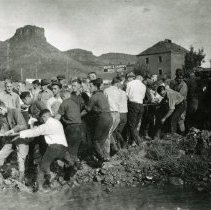 Tug-of-war contest across Clear Creek