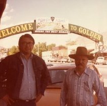Vine Deloria and friend under Welcome Arch