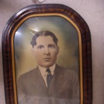 Color tinted framed portrait of young man