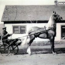 Ralph Churches in front of Churches Store