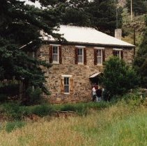 Centennial House, people near front door