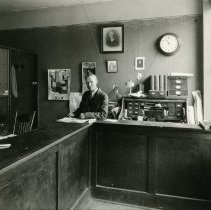 JC Miller in the Transcript Office, 1929