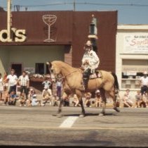 Buffalo Bill Parade by Dud's Cafe and Sportsman Barbershop