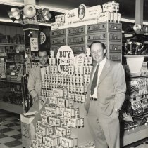 Jack McDermott and Heinie Foss inside Foss Drug Store