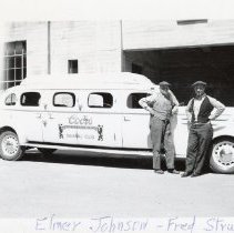 Fred Struck and Elmer Johnson next to Coors Baseball limousine