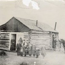 Torrence White Sr. log cabin and family in 1884