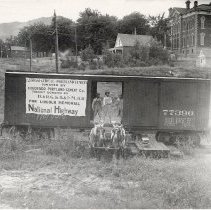 Workmen in a boxcar near Courthouse c. 1895
