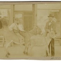 J. H. Brown and boys on burro