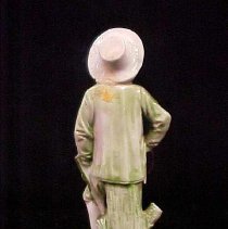 Porcelain Figurine of a Boy