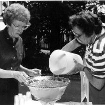Clark and Piper serving punch for the Bird, Tree & Garden Club