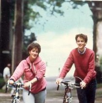 A Couple Walking with Bicycles