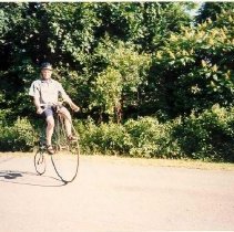 Bicyclist Riding on Australian High Wheeler