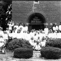 Group Gathered Around Bell Tower