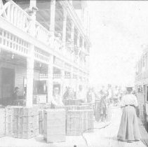 Unloading Steamer Trunks at the Dock