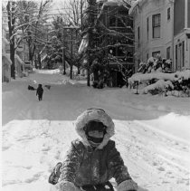 A Child Sledding
