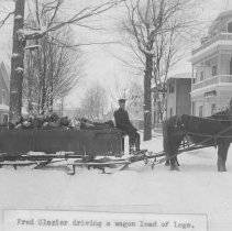 Fred Glazier Driving a Wagon Load of Logs