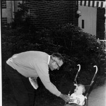 Jim Copeland Plays With Baby
