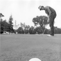 Putting on Golf Course