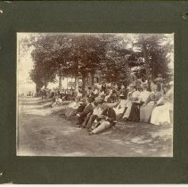 Crowds Waiting by the Pier