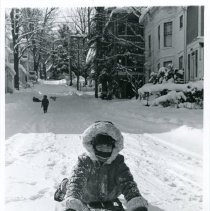 A Child Sledding