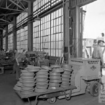 Worker hauling materials