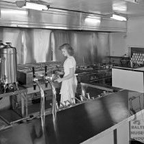 kitchen and worker at The Curb