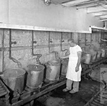 Workers steaming seafood