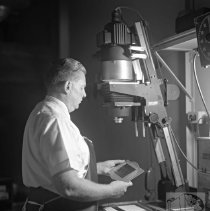 Worker Editing Photos