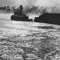 Tugs pulling coal barges