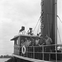 Crew of a G&E co. tug