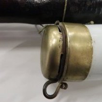 Detail, tarnish on metal