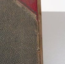 Front cover proper left edge tears and abrading