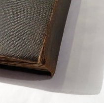 Back cover lower spine tear and abrading