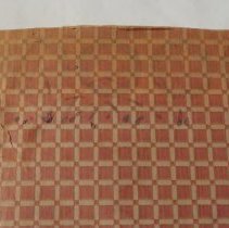 Front cover proper right upper corner faded ink marks