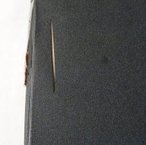 Front cover proper right tear