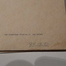 Back cover lower proper right printer mark