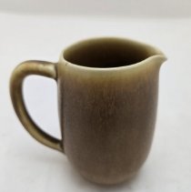 Jug with nertz brown glaze.