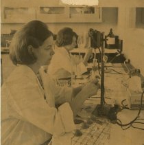 Nancy Keith and unidentified woman in laboratory