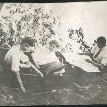 Two Women and a Man in a Canoe