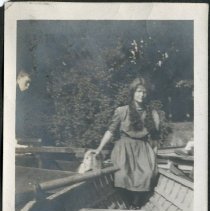 Woman Sitting in Canoe
