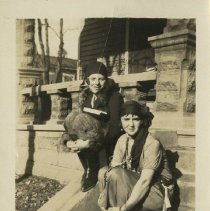 Two freshmen KCOS women on front porch