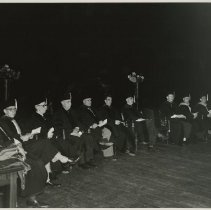 Speakers on stage during 1953 KCOS graduation